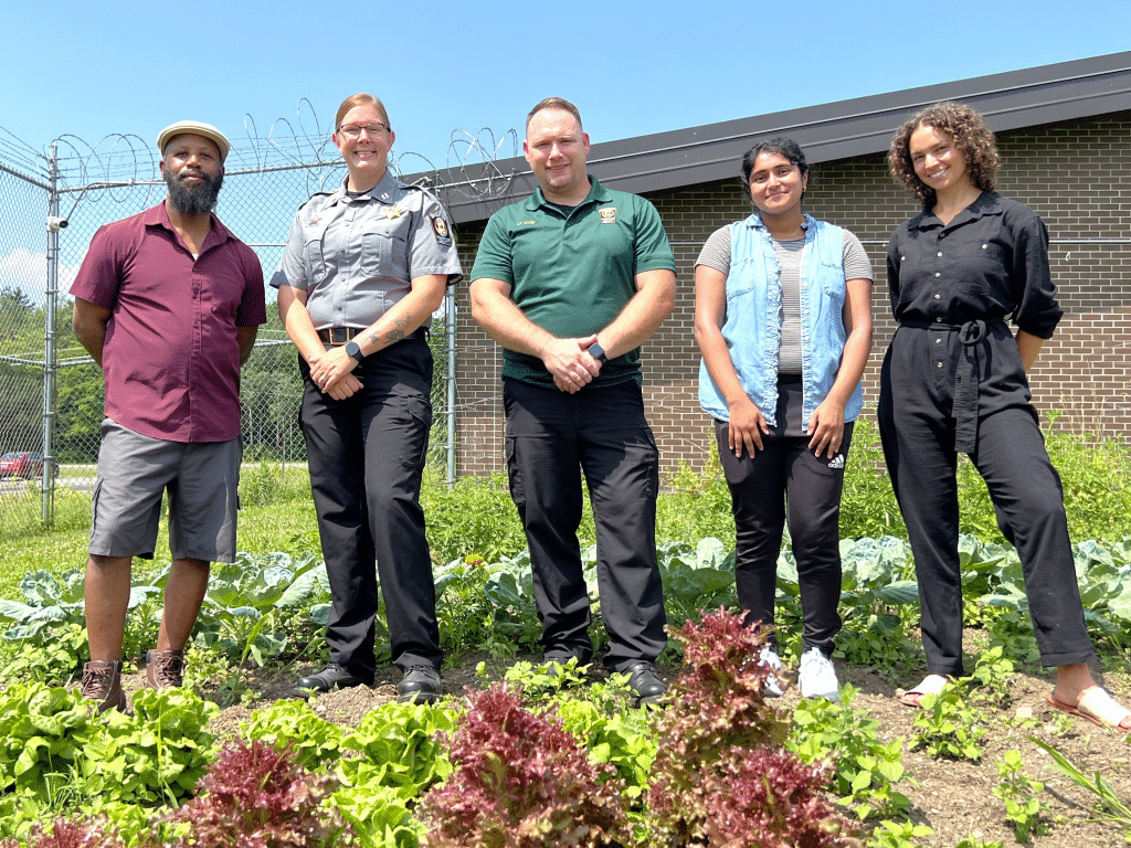 TompkinsWeekly's tweet card. Tompkins Jail Garden grows hope and health in 2025. Discover how inmates benefit from fresh produce in Tompkins County!