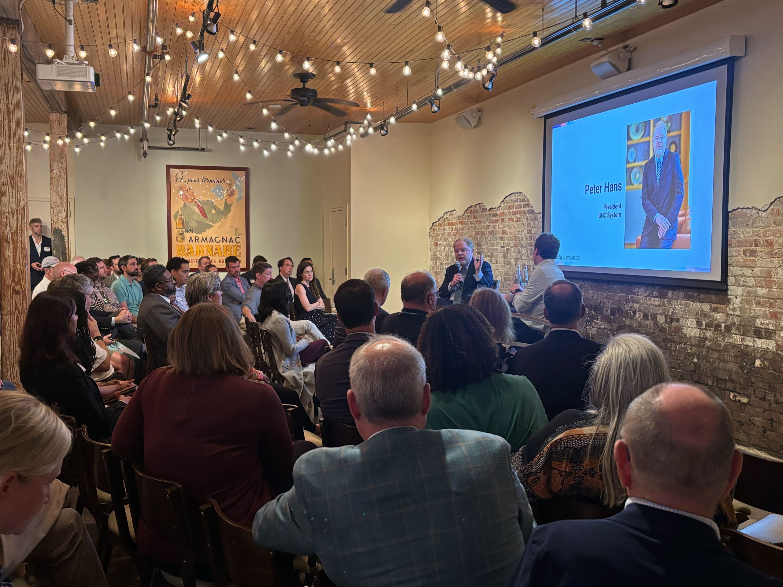 john_drescher's tweet card. UNC System President Peter Hans and other leaders reflected on funding cuts, partisanship, AI, and the importance of liberal arts.