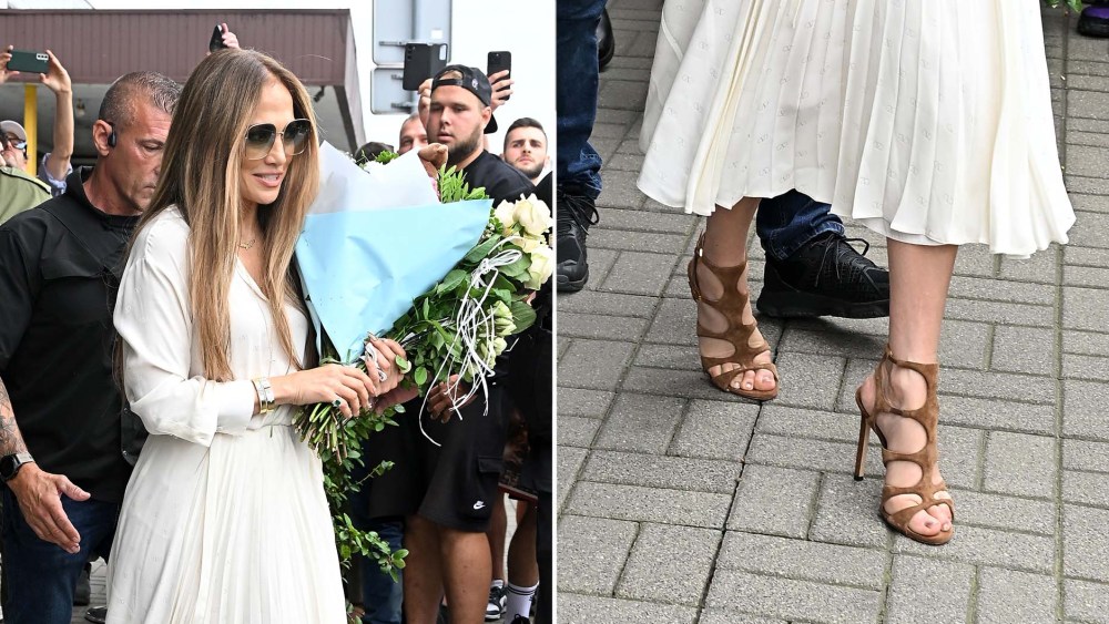 wwd's tweet card. Jennifer Lopez wore Tom Ford’s Paradis sandals in Warsaw on Friday — a suede stiletto that nods to the designer’s signature cutout silhouettes.