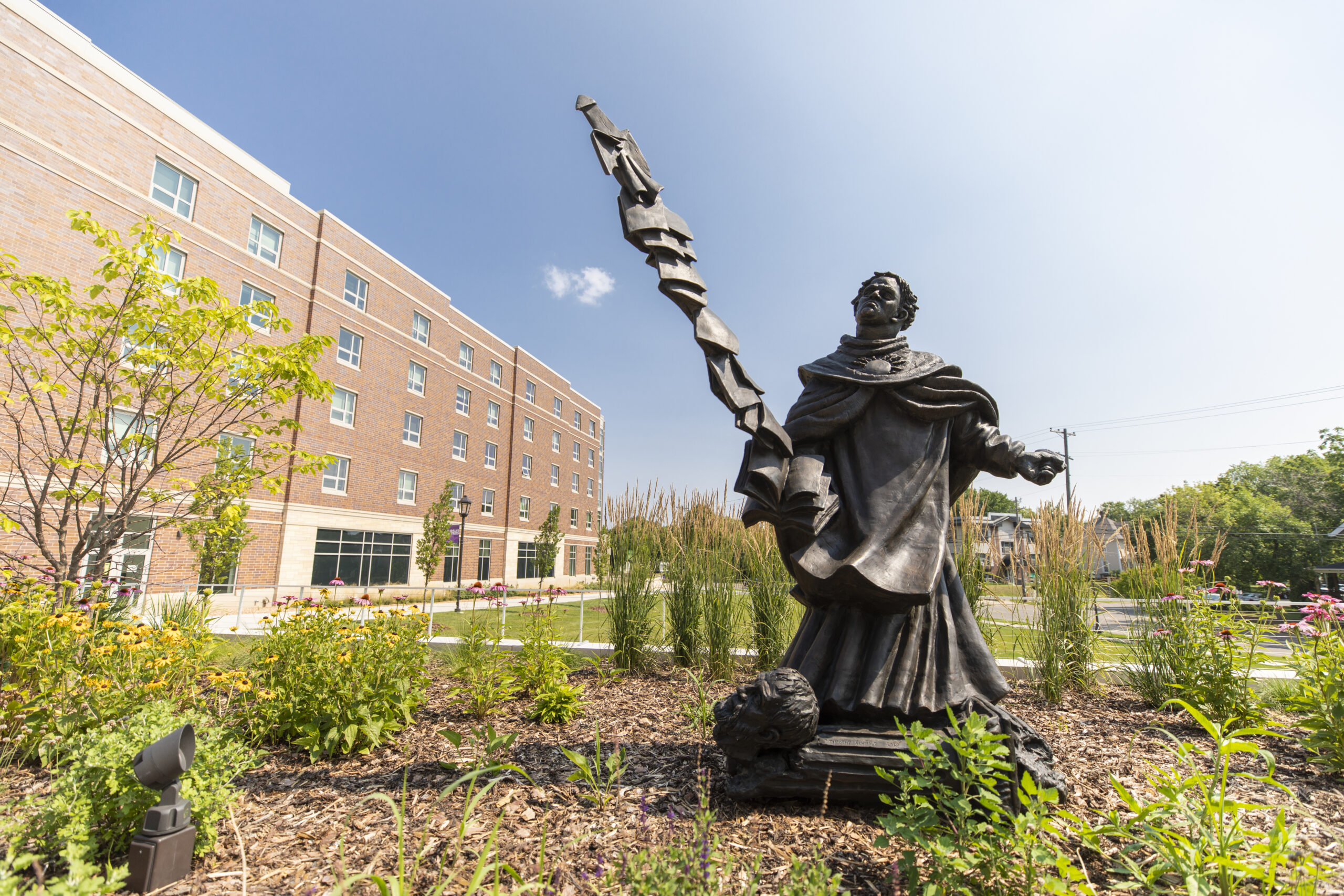 UofStThomasMN's tweet card. As we mark the 800th birthday of St. Thomas Aquinas in 2025, it’s a good opportunity to reflect on the many depictions of our university’s namesake that that adorn the St. Thomas campus.
