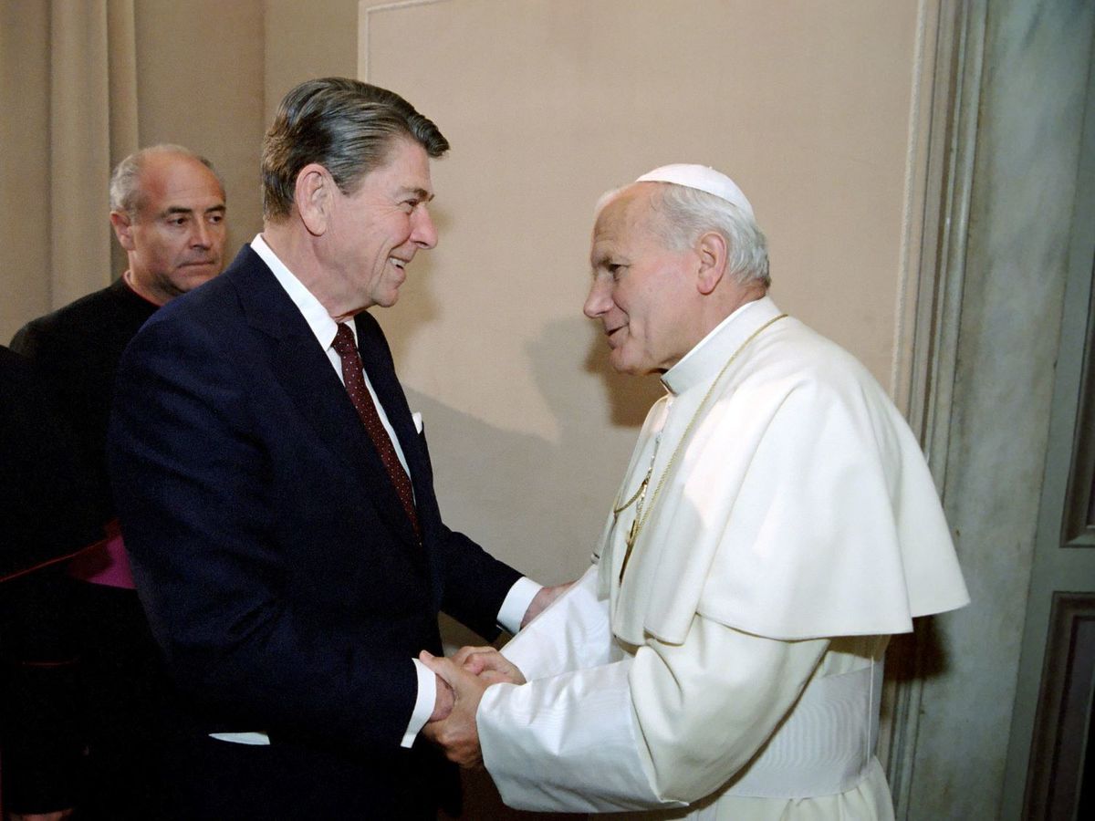 ChurchLifeND's tweet card. Piotr Popiołek on John Paul II's Christian resistance to totalitarianism.