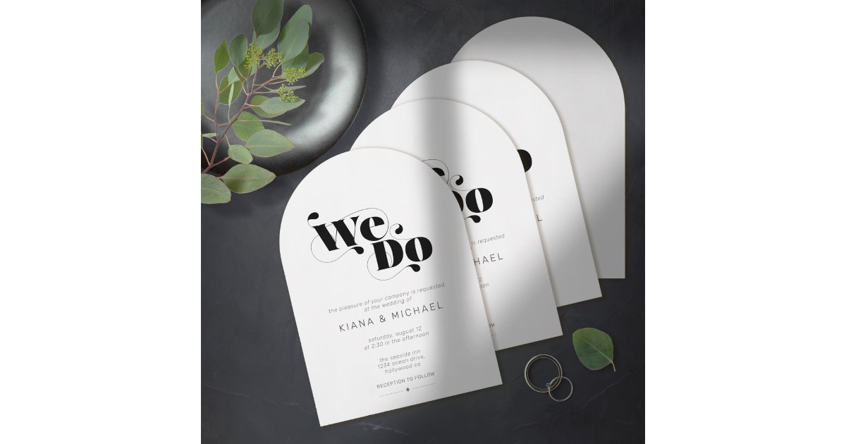 ArrayStores's tweet card. A bold, decorative font immediately catches your eye and sets the tone for most pieces of this modern, minimalist wedding suite. The arch-shaped wedding invitation shown here, with it's informal, 'We...