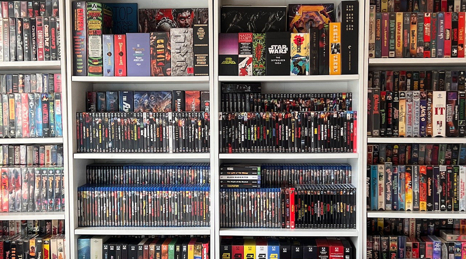 Shout_Studios's tweet card. We here at Shout! are proud of our varied collections of 4K, Blu-ray, DVD, VHS, and more. We've shared a few of our shelves and insights into our collections below, and we'd love to know: what's the...