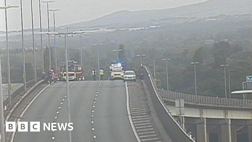 BBCNWT's tweet card. Motorists are urged to avoid the motorway on the outskirts of Manchester.
