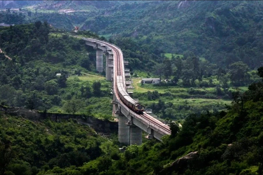 SwarajyaMag's tweet card. Indian Railways Powers Kashmir Rail Infrastructure With Modern Track And Coach Upgrades