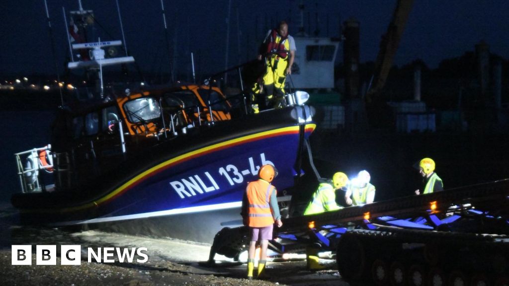 BBCLookEast's tweet card. Four people are rescued from the vessel by two RNLI lifeboats.