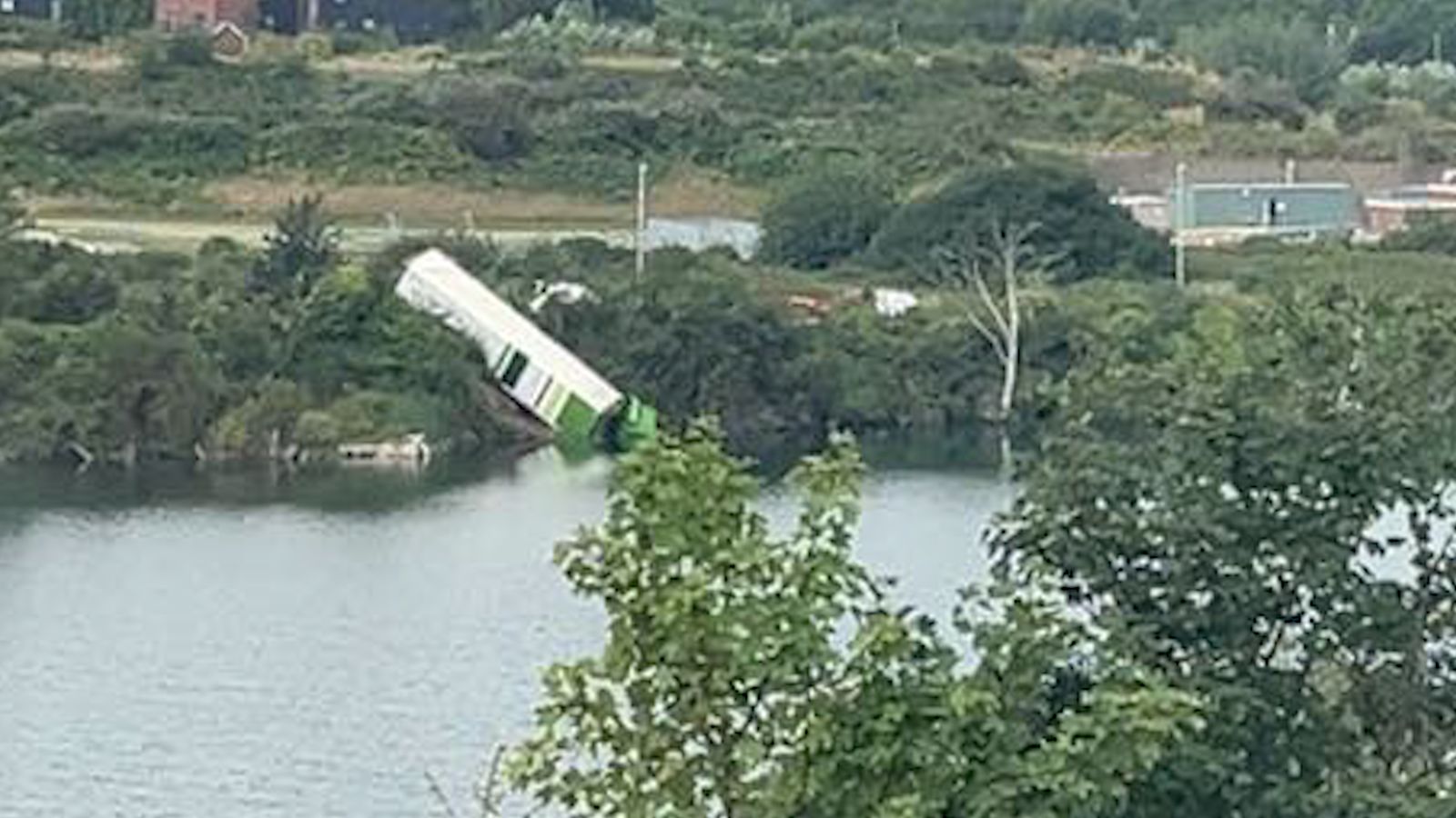 itvmeridian's tweet card. A Waitrose lorry has ended up in a lake sparking an emergency rescue operation. | ITV News Meridian