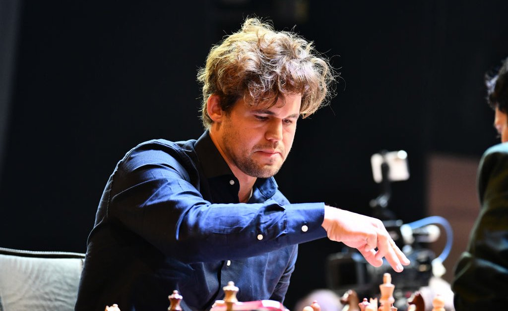 stephengillett's tweet card. The world’s top chess player defeated ChatGPT in an online match in only 53 moves.