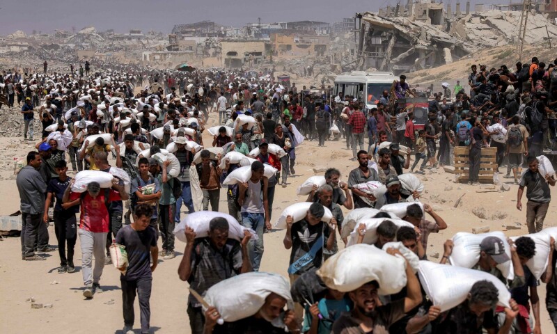 dawn_com's tweet card. UAE, Jordan carry out aid drops; 6 more die from malnutrition; UN vows to use pauses to deliver aid; activist boat seized by Israel.