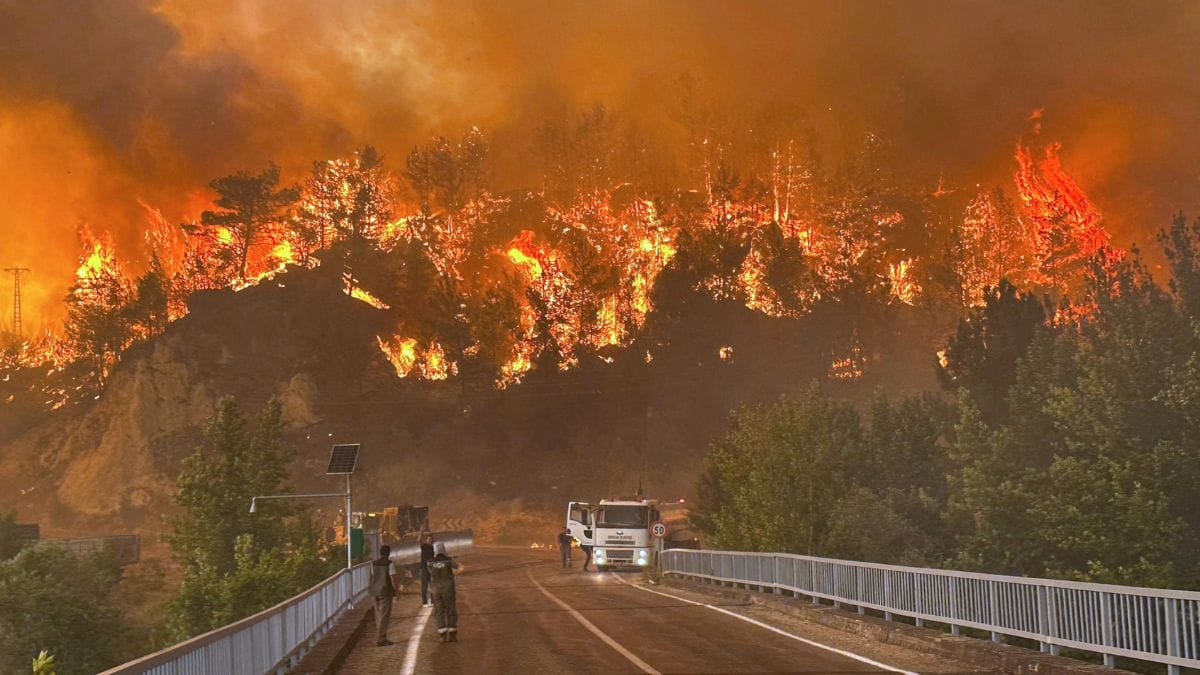 firstpost's tweet card. Firefighters battled wildfires across Turkey on Sunday amid a searing Mediterranean heatwave, with authorities evacuating more than 3,600 people from settlements in two provinces.