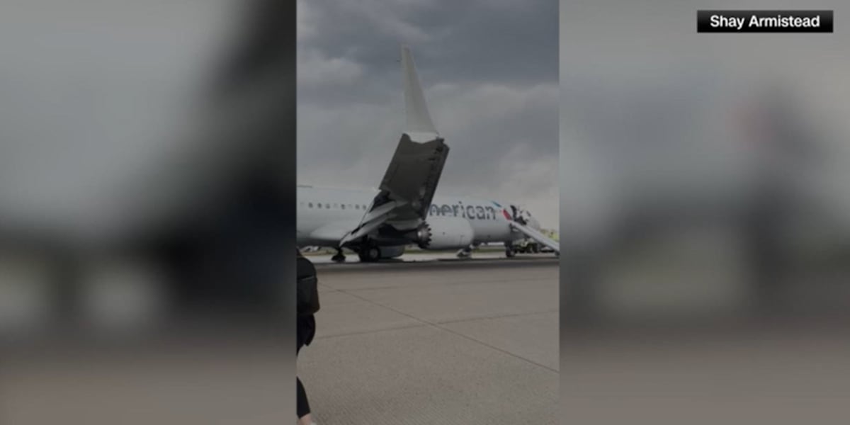 KCBD11's tweet card. Authorities say passengers had to evacuate a smoking American Airlines jet at Denver International Airport using an emergency slide.