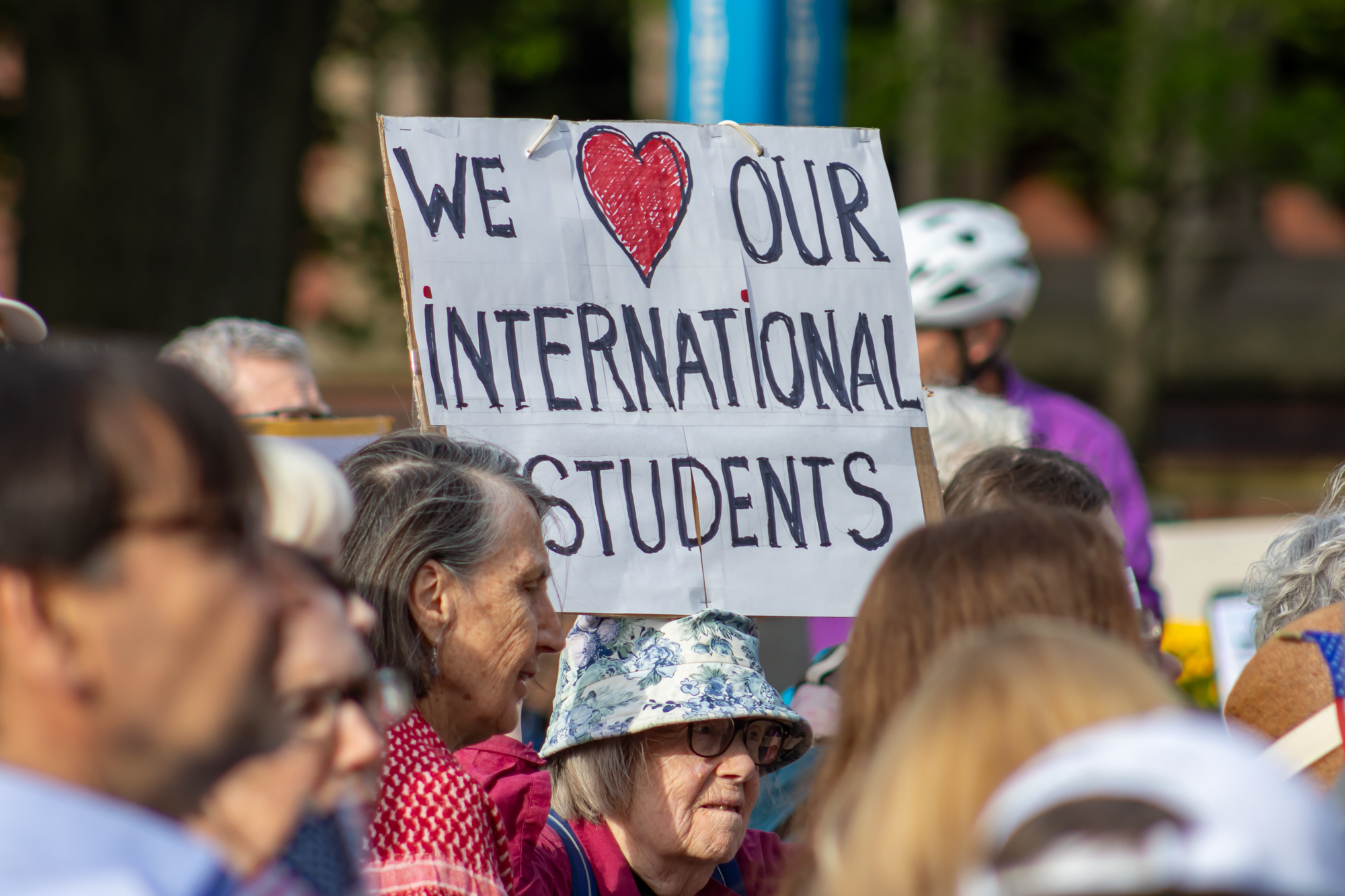 HuntNewsNU's tweet card. More than 300 people gathered at the Science Center at Harvard University May 27 to rally against President Donald Trump’s administration for attempting to block the institution’s ability to enroll...