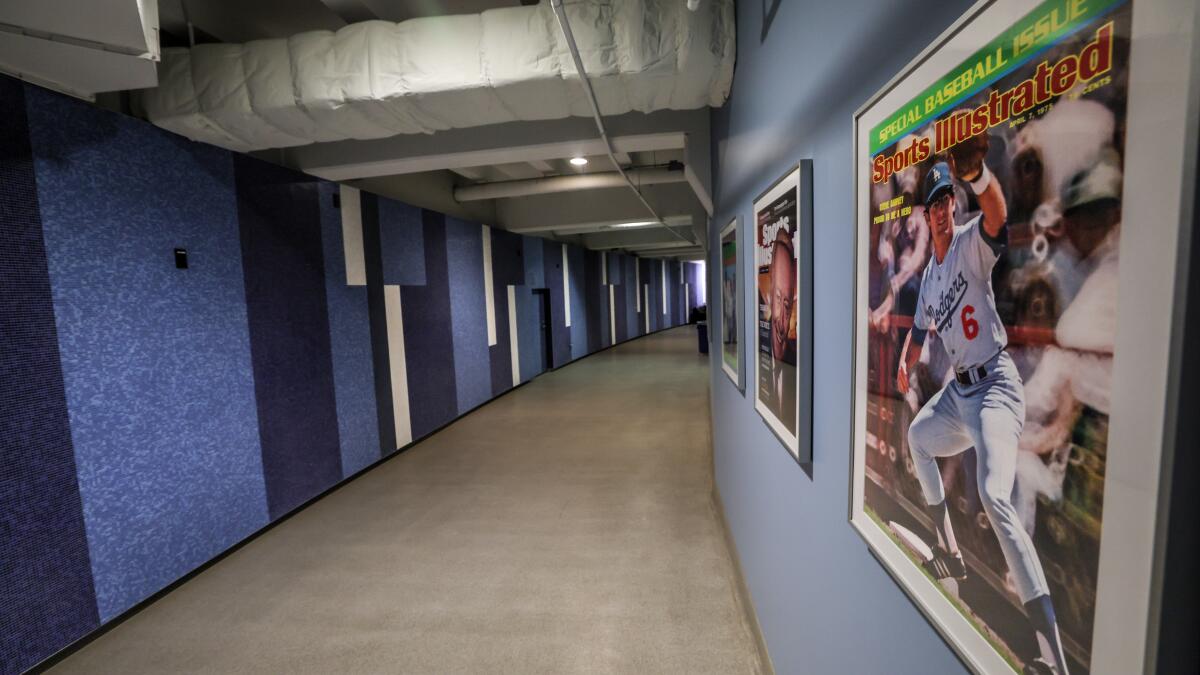 steveclowLA's tweet card. The Dodgers redesigned the hallway leading to the Dodgers' clubhouse this season. It's an ode to the iconic LAX mosaic murals installed in 1961. But there's more to the story.