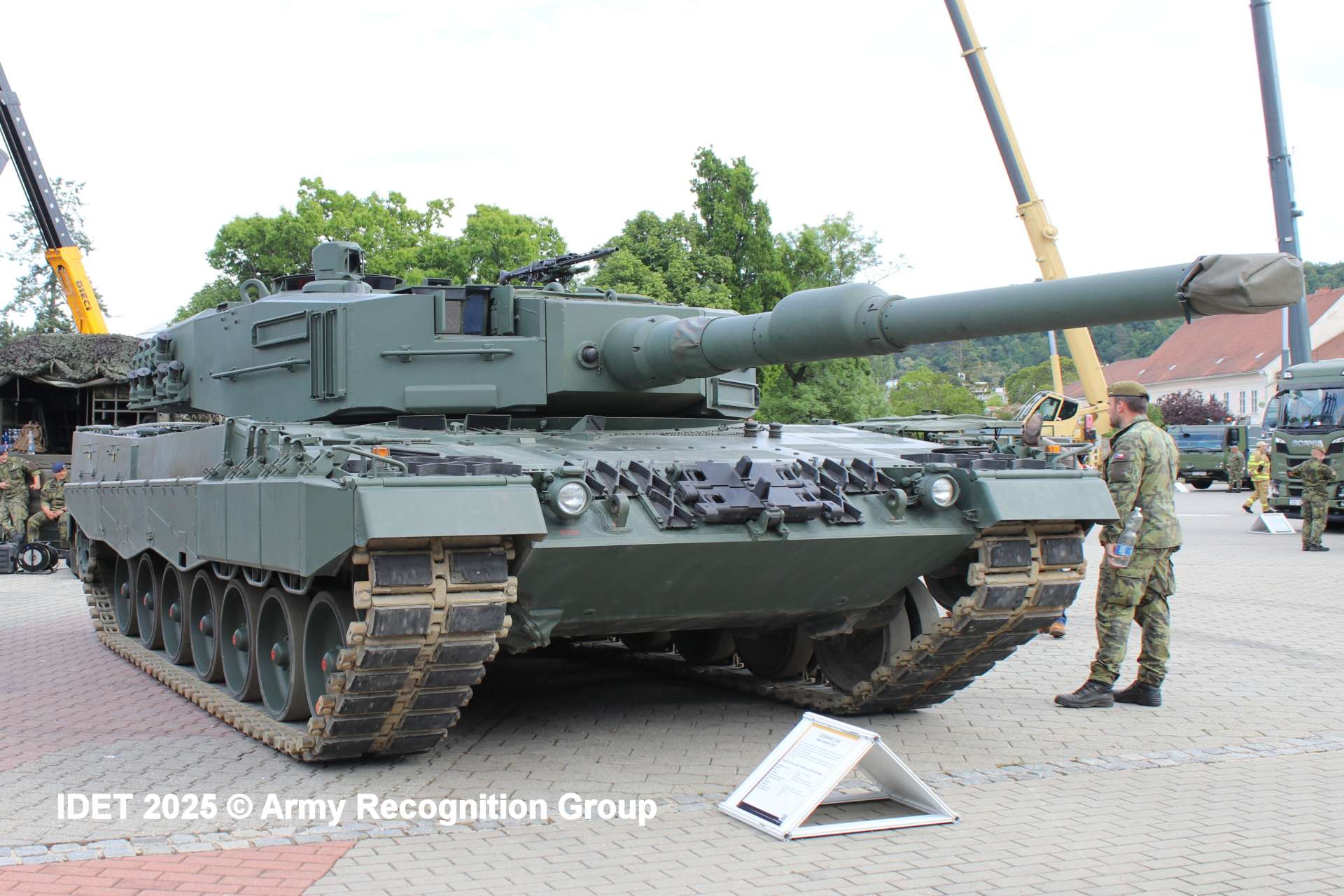 ArmyRecognition's tweet card. Czech Republic Signs Leopard 2A4 Maintenance Deal with Rheinmetall to Modernize Armored Force and...