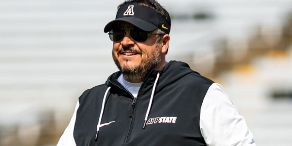 AppStateMania's tweet card. After a furious six-plus months of building his Appalachian State infrastructure, head coach Dowell Loggains shares key updates and observations around Mountaineer football.