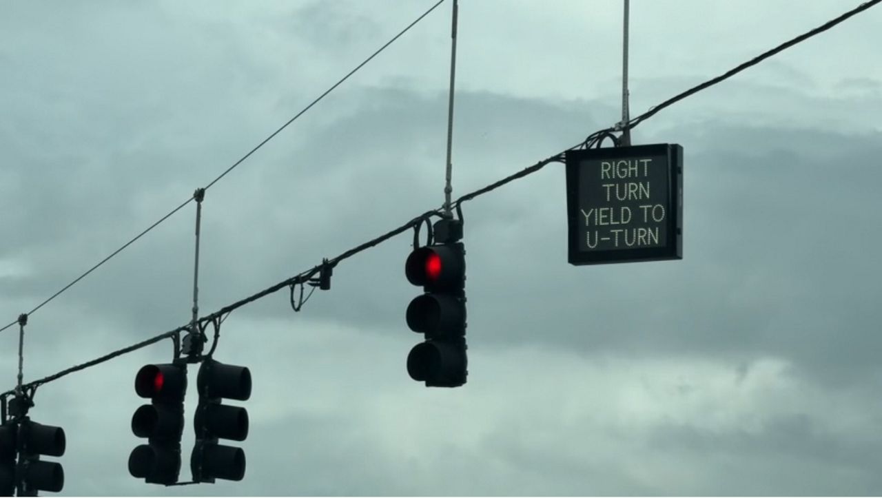 MyNews13's tweet card. FDOT says drivers should abide by a sign that reads “right turn yield to U-turn.”