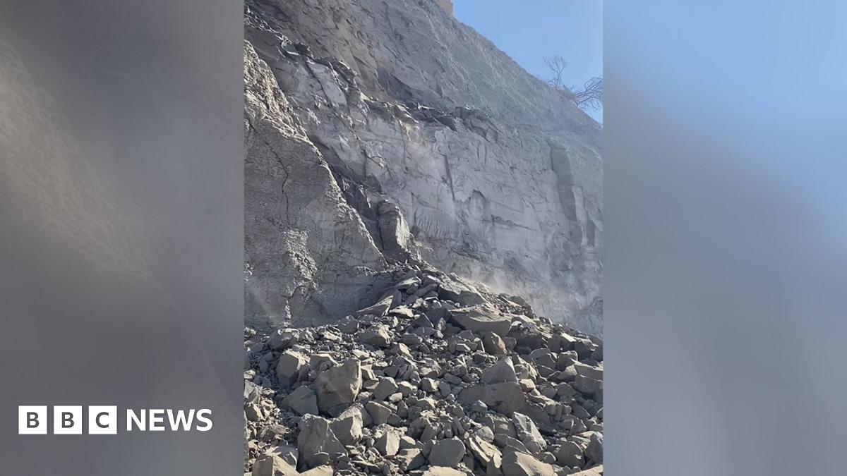 EdwardMorelloWD's tweet card. Visitors are being warned to stay away from the base of cliffs on the Jurassic Coast.