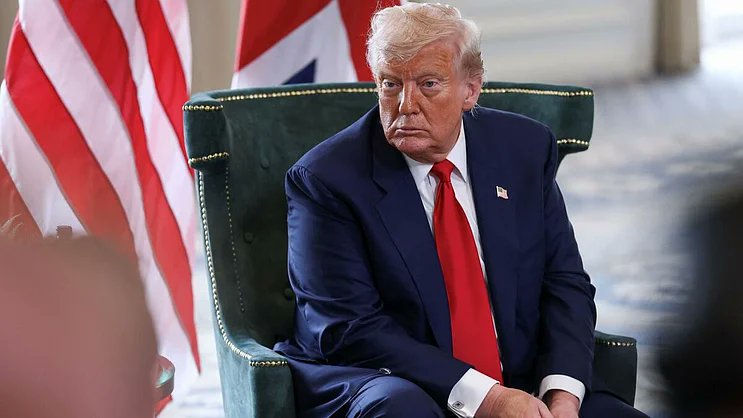 DeccanHerald's tweet card. World News: Trump threatens renewed US strikes on Iran's nuclear sites if Tehran restarts enrichment, during talks with UK PM Keir Starmer in Scotland.