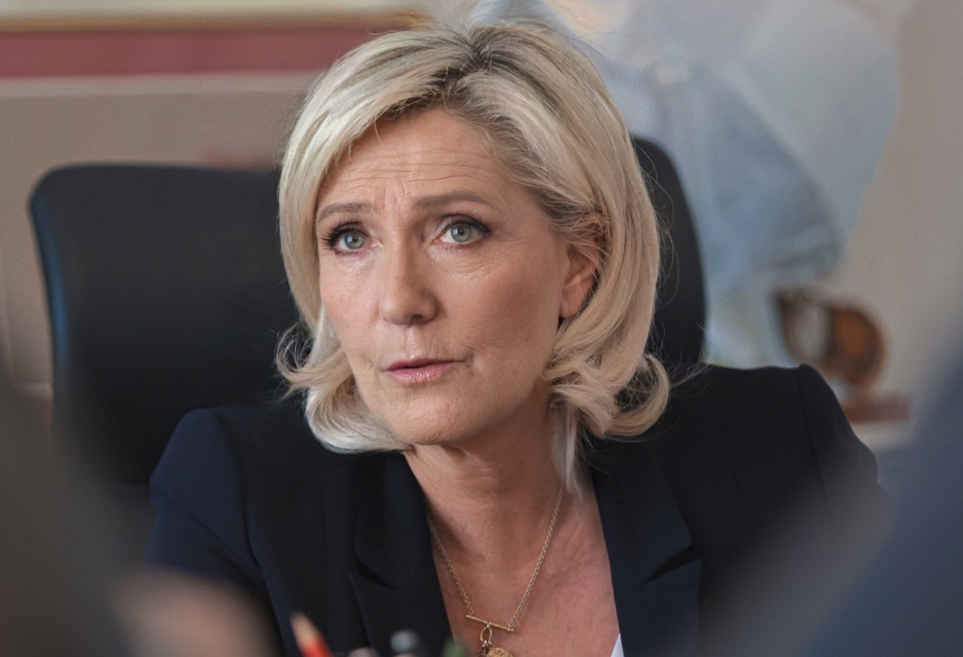DailyTelegraph5's tweet card. Marine Le Pen slams new US-EU trade deal as a “fiasco” that surrenders French industry and EU sovereignty.