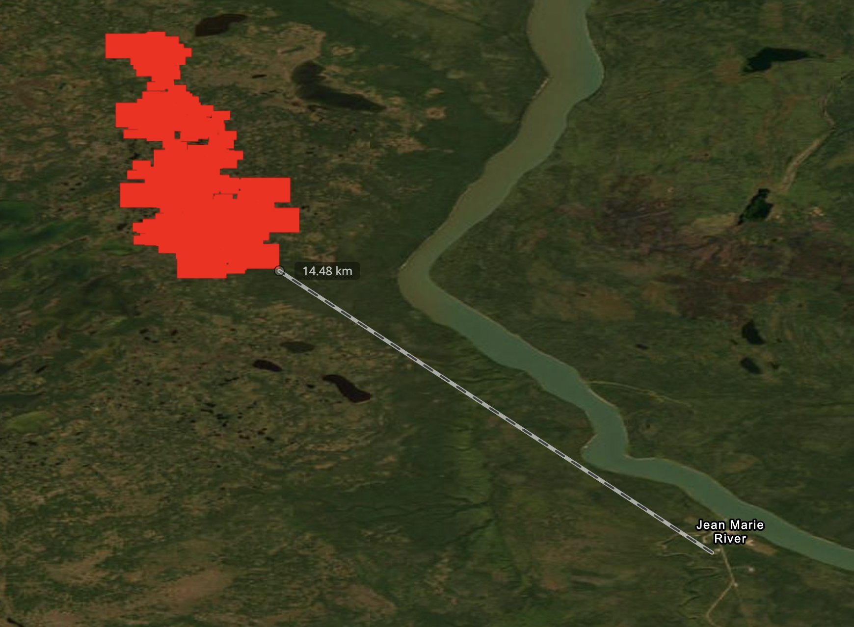 CabinRadio's tweet card. NWT Fire says a change in wind direction has reduced the risk of a wildfire reaching Jean Marie River in the next day or two.