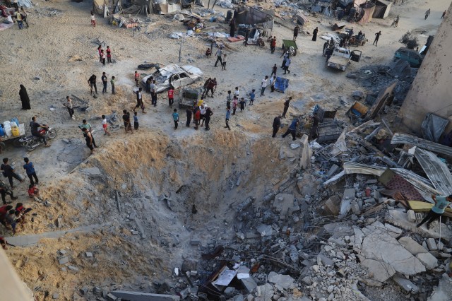 WGNMorningNews's tweet card. DEIR AL-BALAH, Gaza Strip (AP) — Israeli strikes or gunfire killed at least 78 Palestinians across the Gaza Strip on Monday, including a pregnant woman whose baby was delivered after her death but …