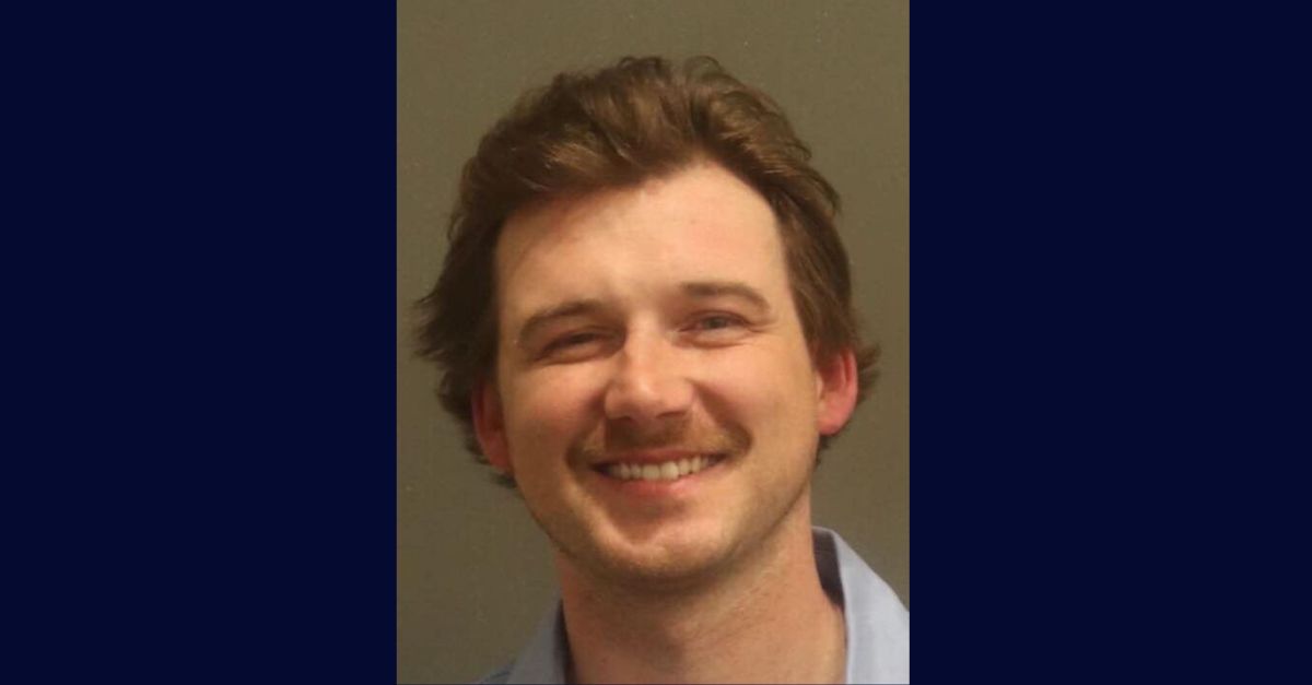 lawcrimenews's tweet card. Country singer Morgan Wallen was arrested and charged after police in Nashville say he threw a chair off the roof of a six-story building.