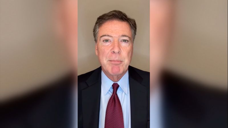 jasoncarrollcnn's tweet card. Former FBI Director James Comey reacts after being indicted by a federal grand jury.