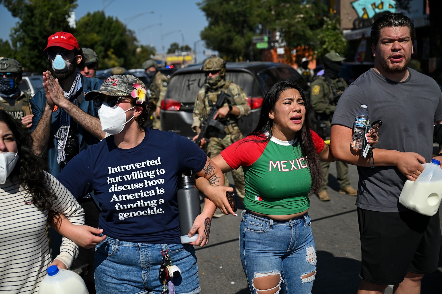 davidaxelrod's tweet card. A woman was shot, sparking protests Saturday. Illinois Gov. JB Pritzker warned that 300 National Guard troops are being activated against his wishes.