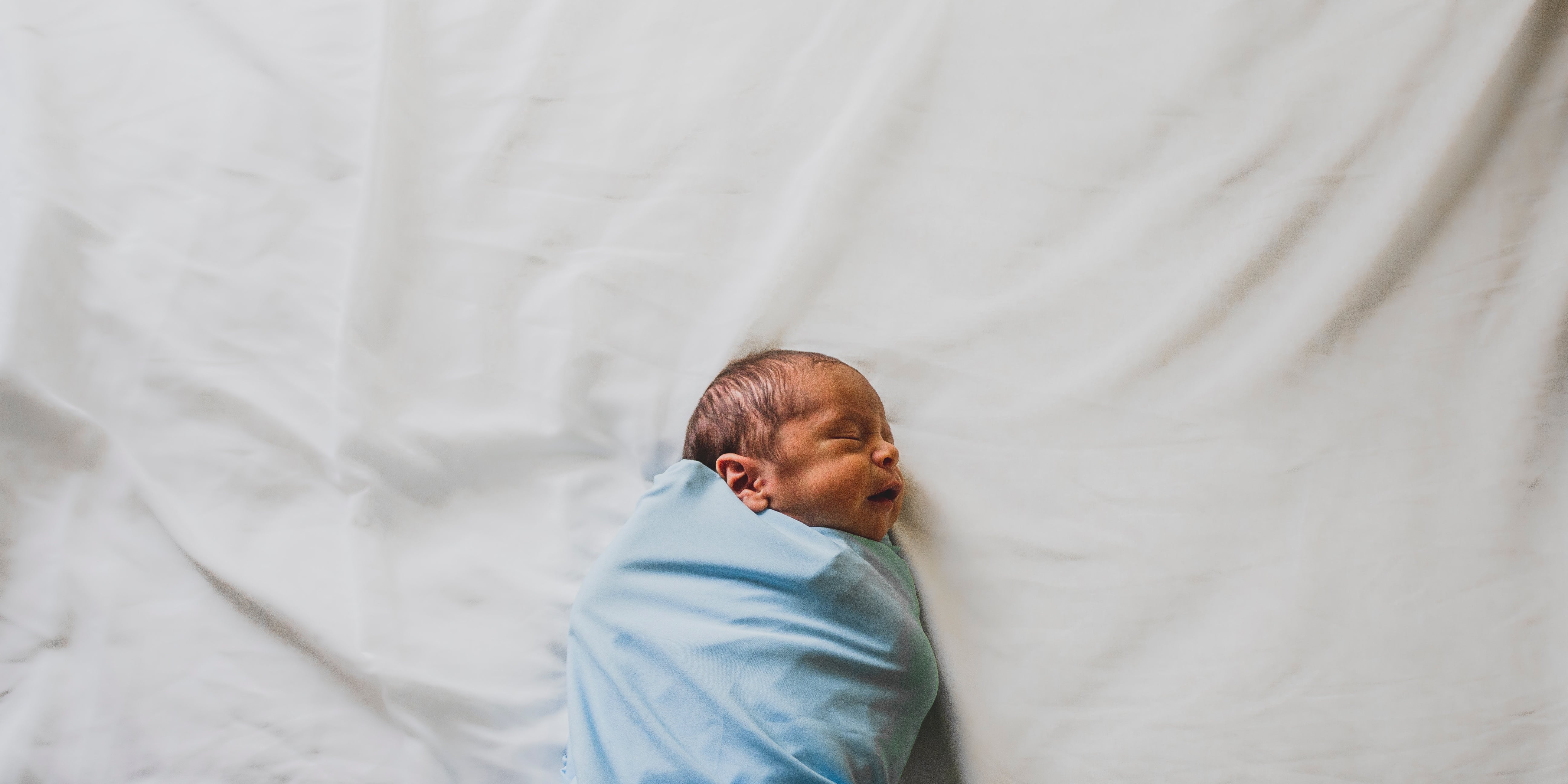 POPSUGARMoms's tweet card. This guide explains how to swaddle a baby and other questions you might have about the technique, like how long to swaddle a baby each day.