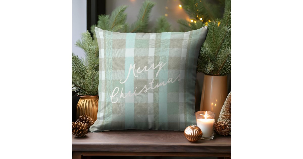 ArrayStores's tweet card. Capture the serene beauty of the coast with this charming tartan pattern in soothing shades of teal, white, and beige. The soft color palette adds a fun and beachy feeling to this throw pillow...