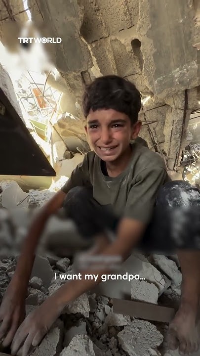 loreduck22's tweet card. Palestinian child searches for his grandparents killed by Israeli army