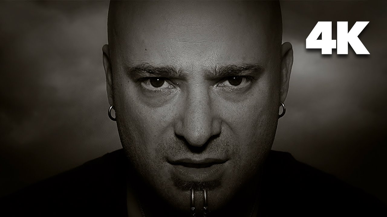 Docs_Delphi's tweet card. Disturbed - The Sound Of Silence (Official Music Video) [4K UPGRADE]