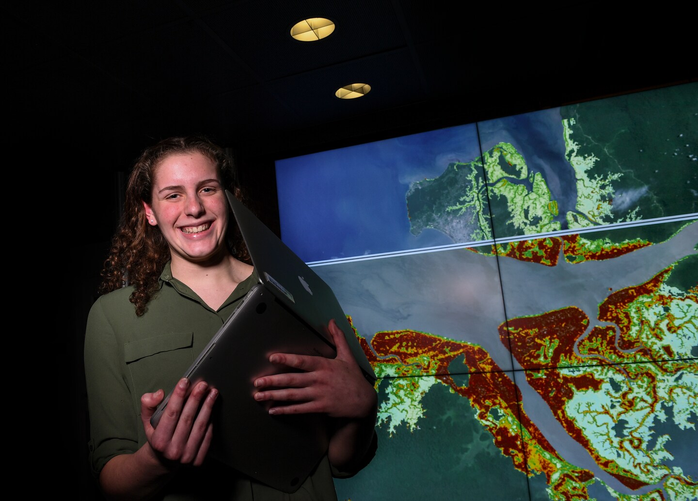 ruthef's tweet card. Liza Goldberg is using satellites to monitor imperiled mangroves and has spoken about her research at a prestigious conference.