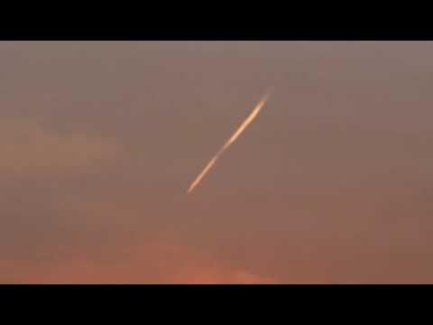 ContrailsC's tweet card. 6 1 5 20 and 7 5 2021 engineered sky, halo sunset.
