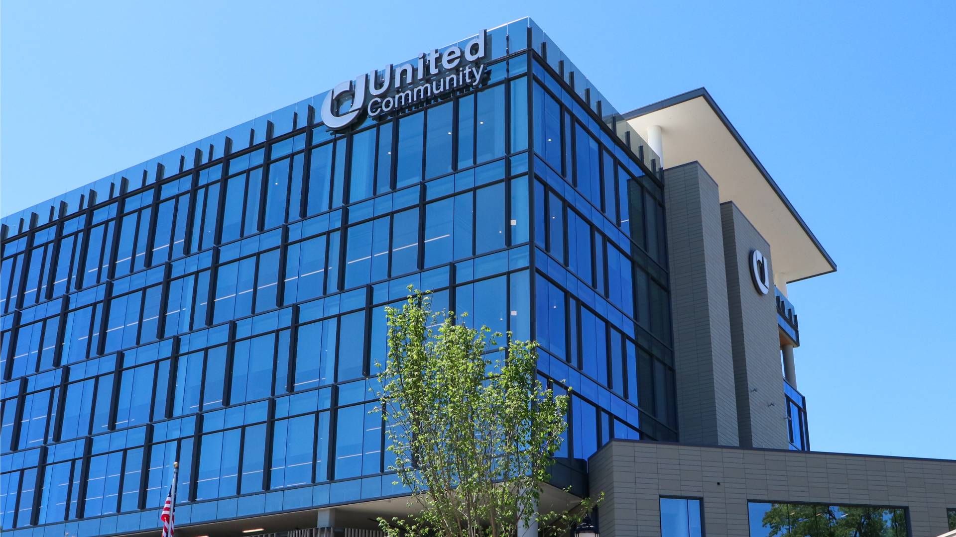 SCUpstate's tweet card. United Community celebrates 75 years of service and growth, evolving from a small Georgia bank to a $65M HQ in downtown Greenville.