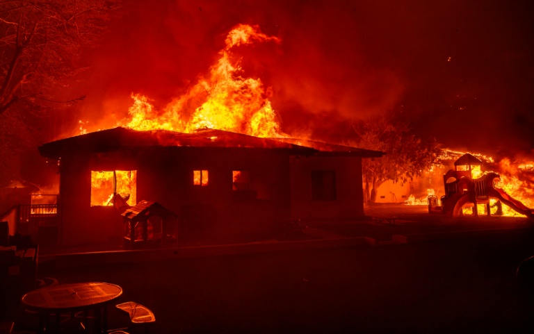 AisixSolutions's tweet card. The Los Angeles blazes in January constitute the largest-ever insured wildfire loss event by far, reaching an estimated $40 billion, said Swiss Re - Copyright GETTY IMAGES NORTH AMERICA/AFP/File...