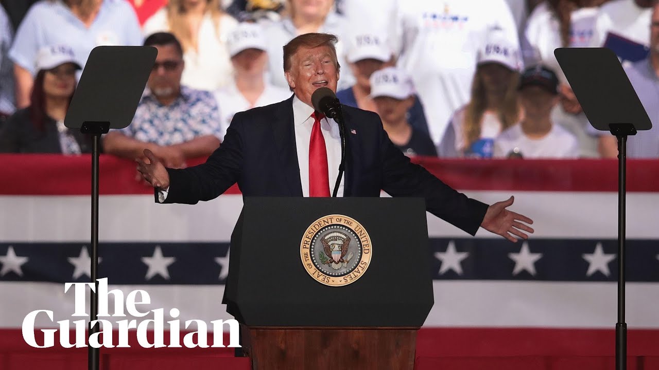 TomHTweets's tweet card. Trump laughs after audience member suggests shooting migrants