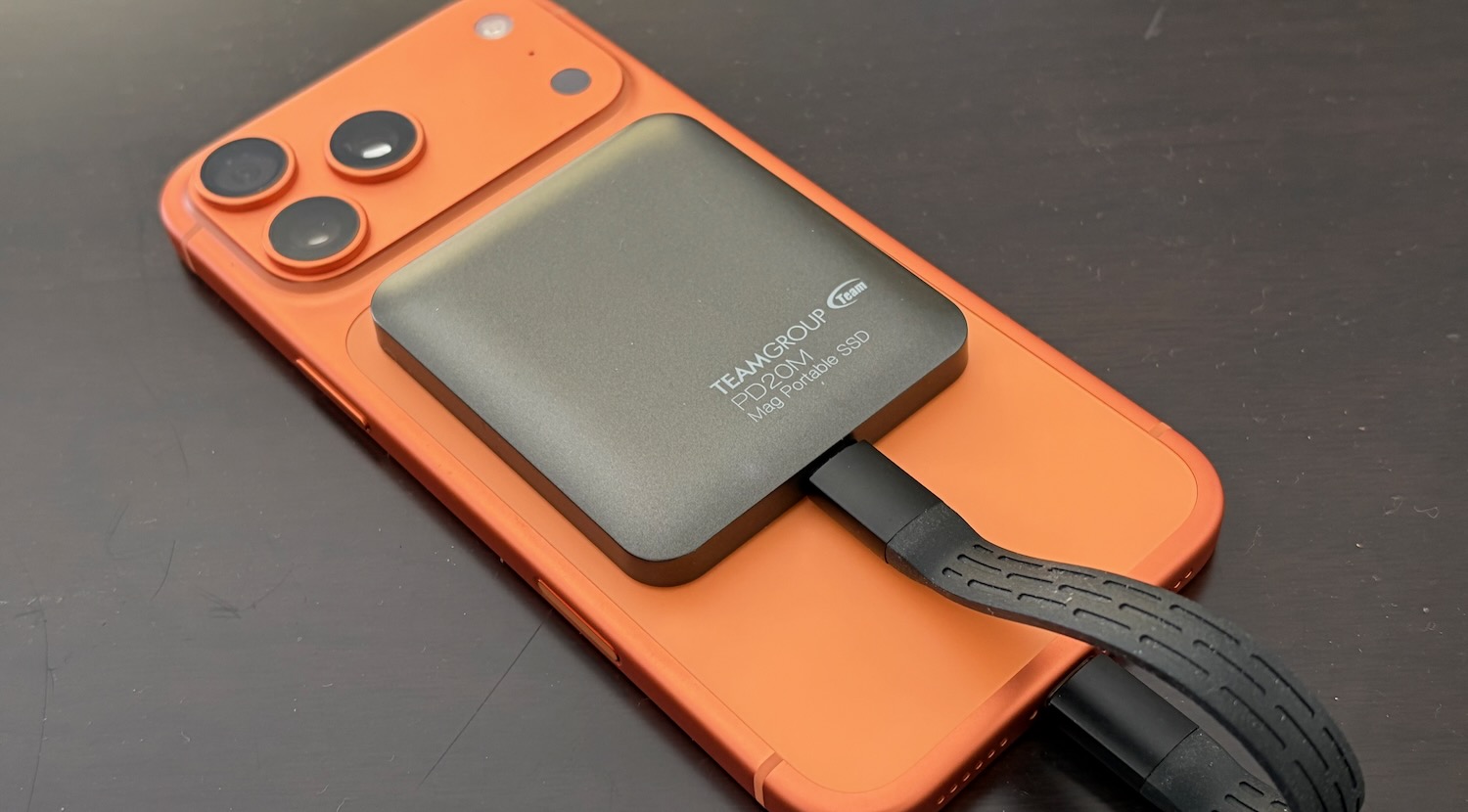 TechGuideAU's tweet card. Extra storage is always something we need for our smartphones and TeamGroup has come up with a solution – a MagSafe compatible portable SSD. The PD20M Mag portable SSD drive has a rounded design and...