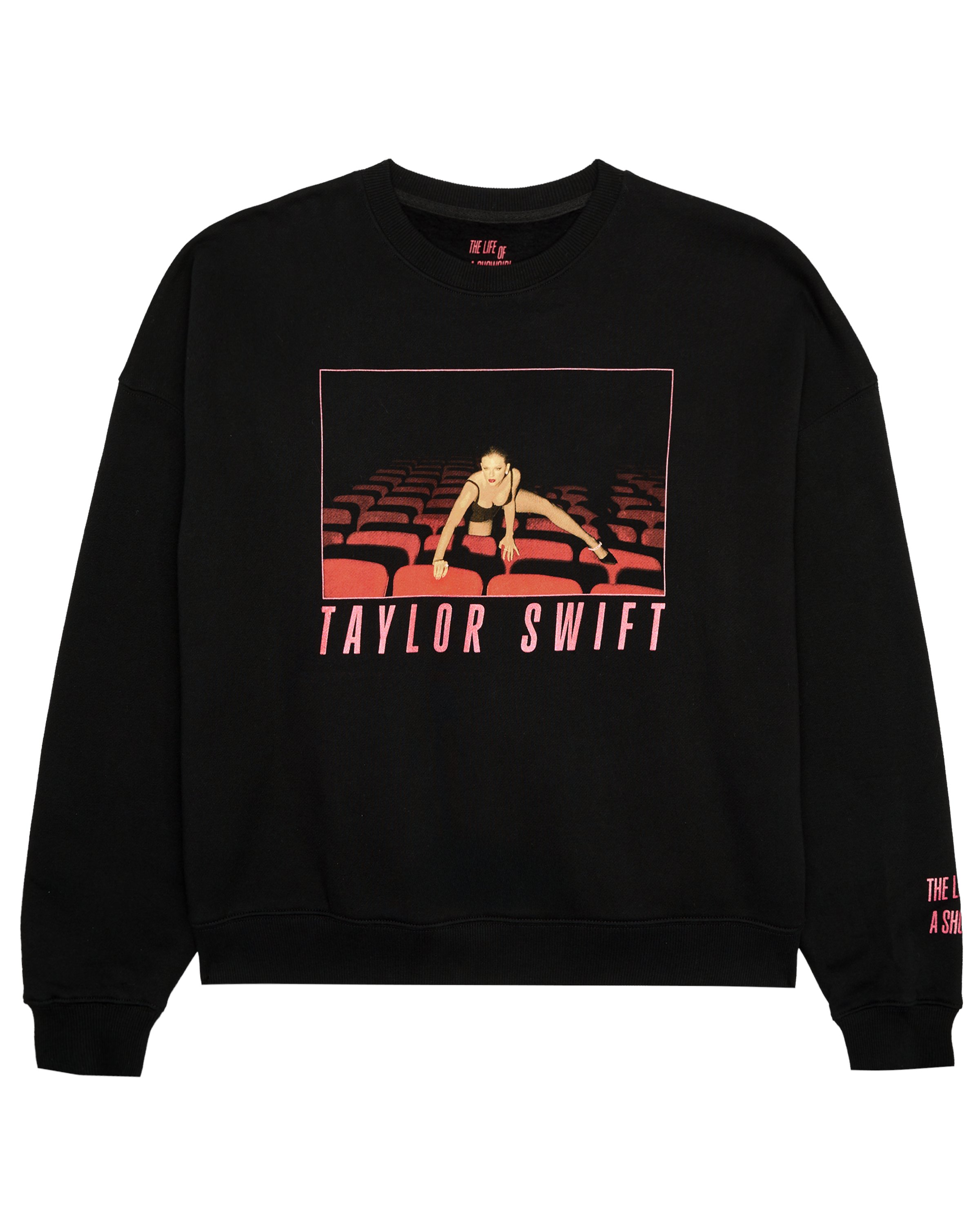 swiftpitch_uk's tweet card. Ships within 3 daysBlack long sleeve crewneck sweatshirt featuring "Taylor Swift" logo in red glitter and photo of Taylor Swift with red sparkle border printed on front with "The Life of a Showgirl"...