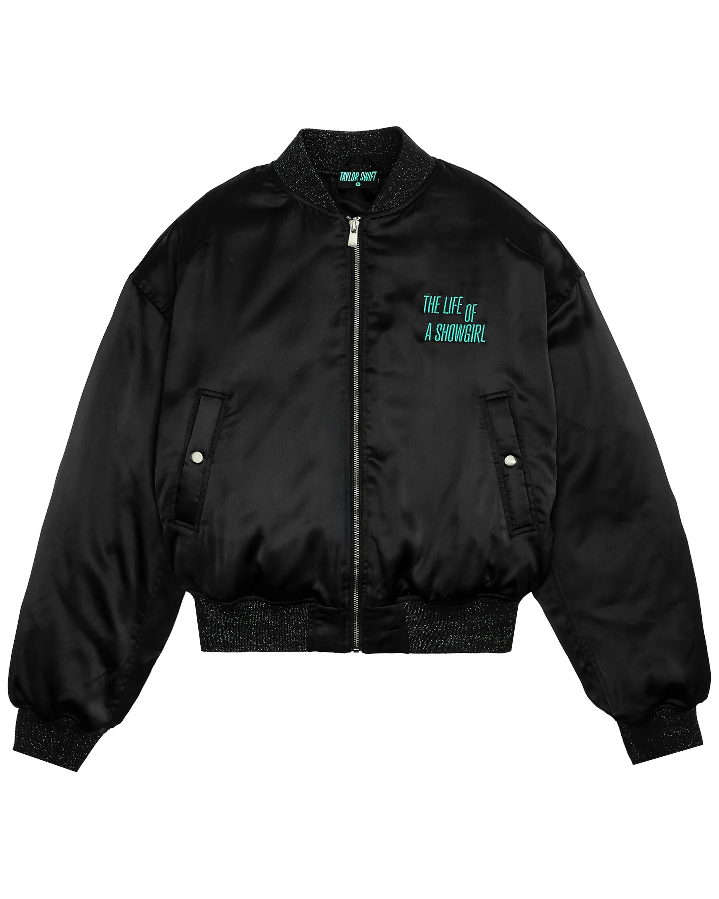 Alerts4Merch_CA's tweet card. BLACK SATIN BOMBER JACKET WITH SILVER LUREX FLEX RIB TRIM FEATURING "THE LIFE OF A SHOWGIRL" ALBUM LOGO EMBROIDERED IN MINT GREEN LUREX ON WEARER'S FRONT LEFT CHEST AND "THE LIFE OF A SHOWGIRL" ALBUM...