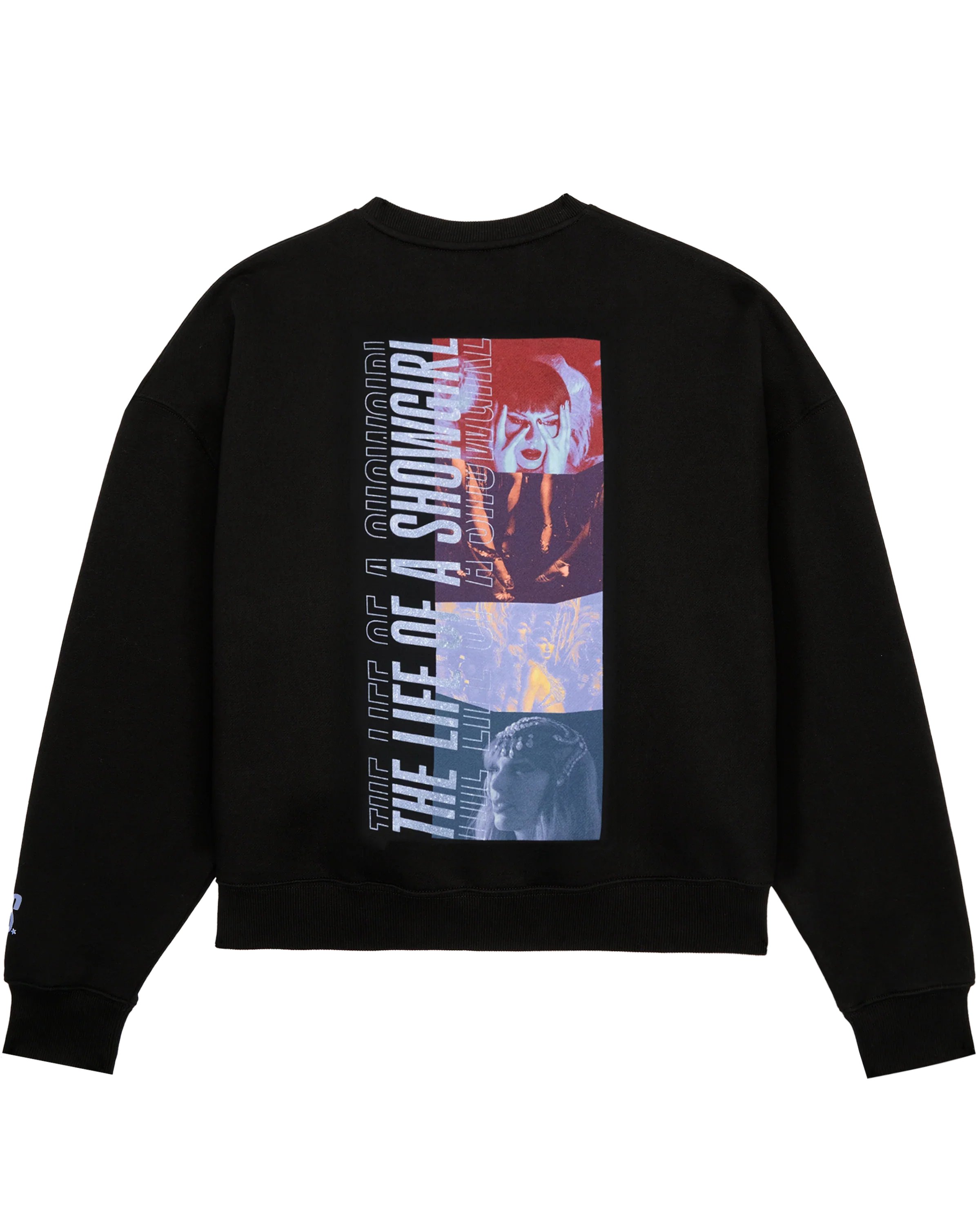 Alerts4Merch_CA's tweet card. BLACK LONG SLEEVE CREWNECK SWEATSHIRT FEATURING "THE LIFE OF A SHOWGIRL" ALBUM LOGO IN VIOLET SPARKLE PRINT ON FRONT AND "THE LIFE OF A SHOWGIRL" ALBUM LOGO IN VIOLET SPARKLE WITH PHOTOS OF TAYLOR...
