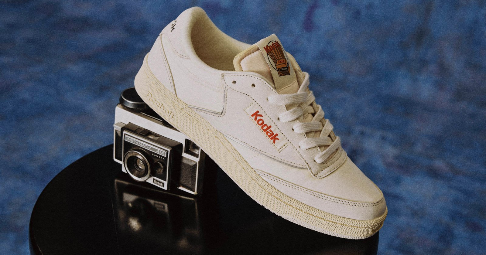 petapixel's tweet card. Kodak and Reebok have collaborated on a line of shoes, shirts, and pants that bear analog iconography and vintage design.