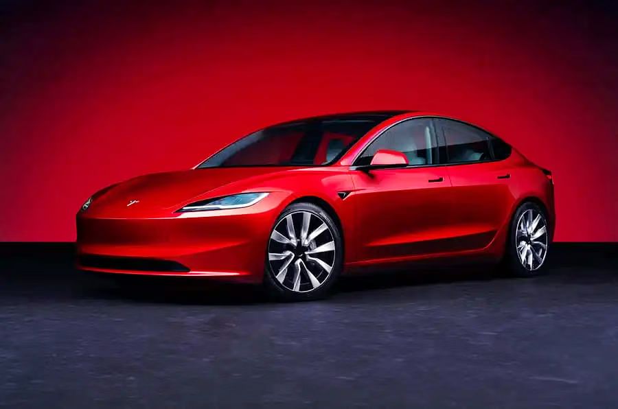 jay_kotakone's tweet card. KMPL will offer specially curated finance schemes for Tesla buyers through the company's India portal.