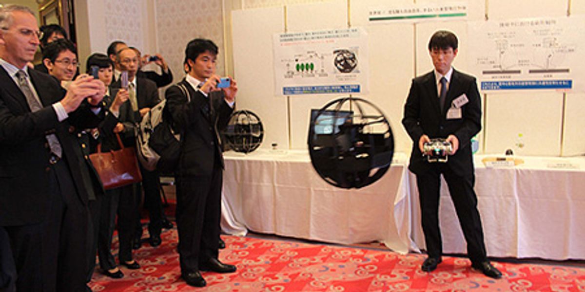 robotbox's tweet card. Why does the Japanese Ministry of Defense need a flying robot soccer ball? We can only hope it’s for flying robot soccer