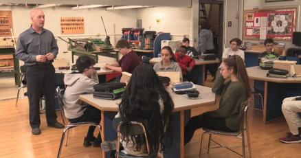 TechEdSMS's tweet card. 8th grade students, under the watchful eye of some Lutron engineers, learned how to make electronic coin counting machines.