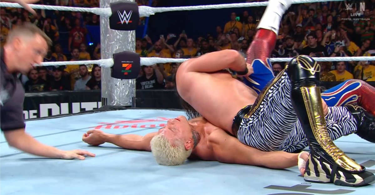 cagesideseats's tweet card. He used a watch and a cheap shot after a ref bump, but he finally got the job done.