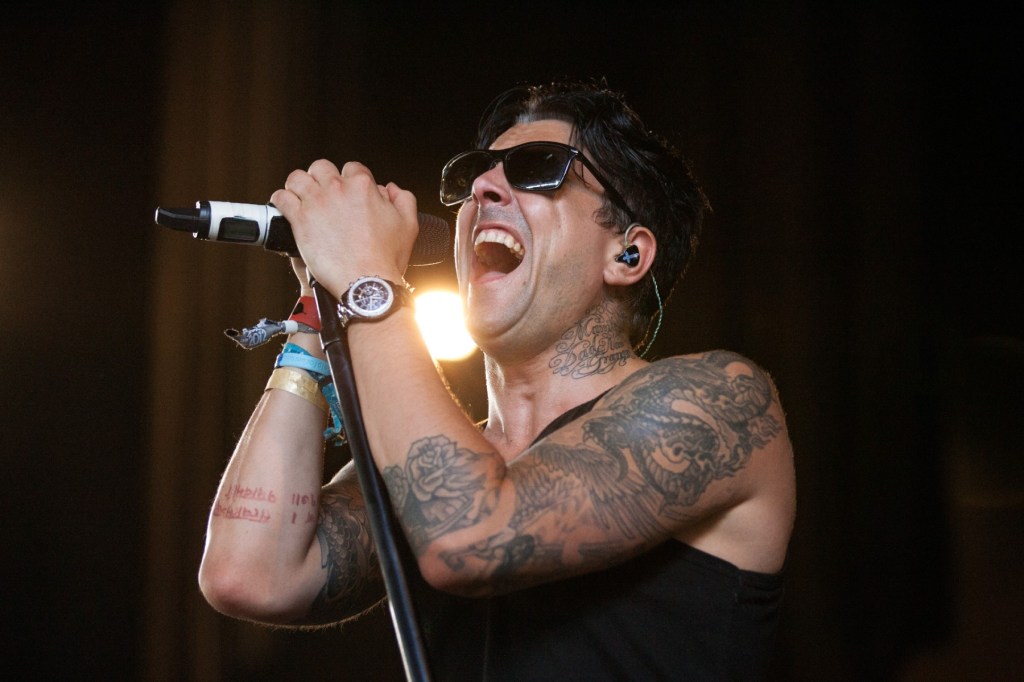 billboard's tweet card. Ian Watkins, the former lead singer of rock band Lostprophets and a convicted pedophile, was killed in a prison attack in the United Kingdom.