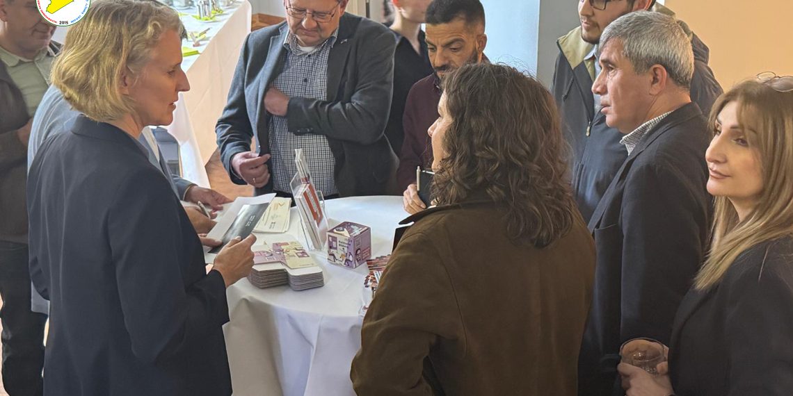 PYD_Rojava's tweet card. شارك الرئيس المشترك لمكتب العلاقات في مجلس سوريا الديمقراطية، حسن محمد علي، في ورشة عمل سياسية عُقدت في العاصمة الألمانية