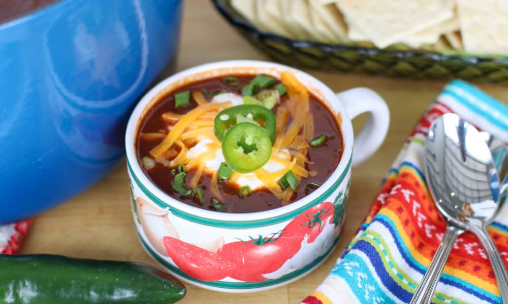 servfromscratch's tweet card. This hearty beef chili is loaded with chunks of beef, bacon, and a little spice to keep things interesting. It is slow-cooked until deeply flavored with a meaty kick and addition of beans.