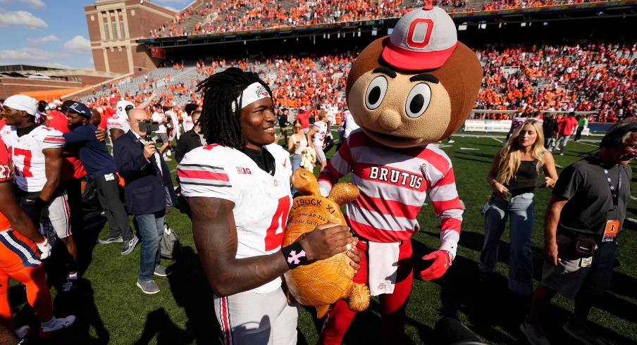 11W's tweet card. Jeremiah Smith, Jermaine Mathews Jr. and other Buckeyes held Illibuck aloft on the field of the Fighting Illini after Ohio State beat Illinois 34-16 on Saturday afternoon.